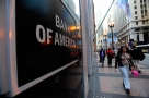 people walk by bank of america